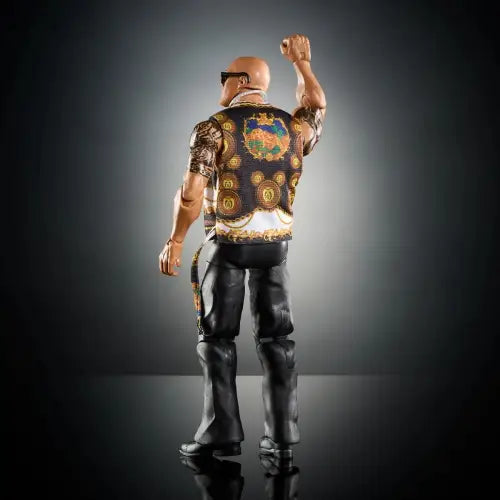 Bald action figure in patterned shirt from WWE Elite Collection Series 115 The Rock