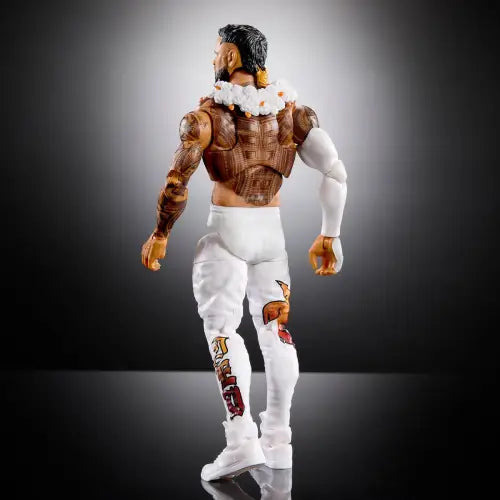 Muscular wrestler action figure in white attire from WWE Ultimate Edition Jey Uso