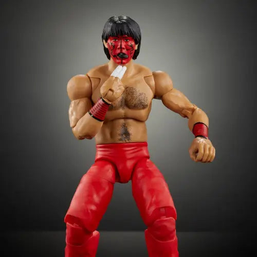 Red-clad WWE Ultimate Edition The Great Muta wrestling action figure display