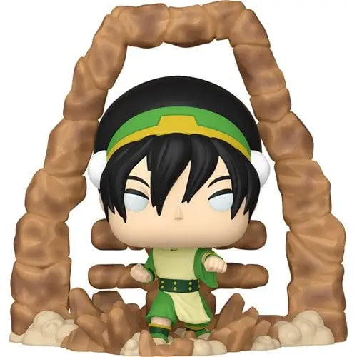 Funko Pop figure of Toph from Airbender in green attire within rocky archway