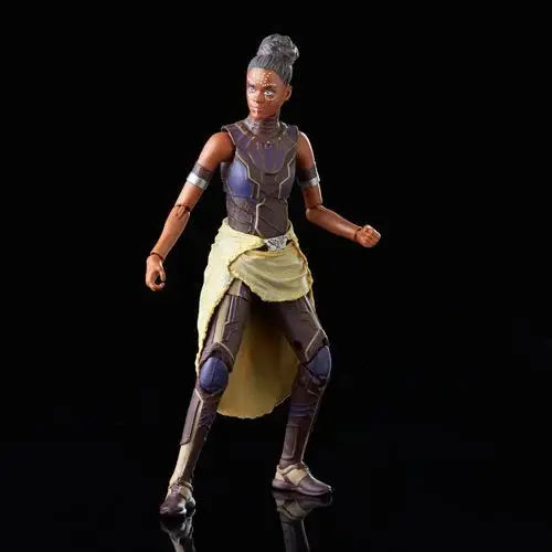 Marvel Legends Shuri 6-Inch Action Figure featuring a woman in a yellow dress and black shoes