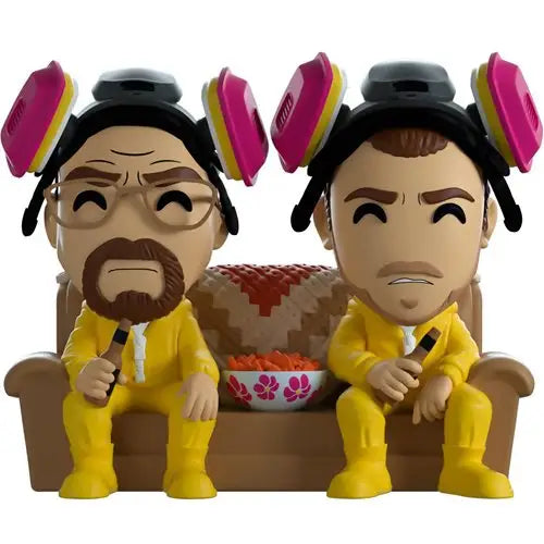 Breaking Bad Walt & Jesse Vinyl Figure sitting on a couch with food bowl