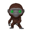 Funko Pop figure of a brown Bigfoot with glowing green eyes from Godzilla x Kong