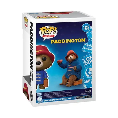 Funko Pop Paddington figure with suitcase on white background