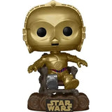 Gold Star Wars C-3PO Funko Pop in chair celebrating Jedi 40th Anniversary vinyl figure
