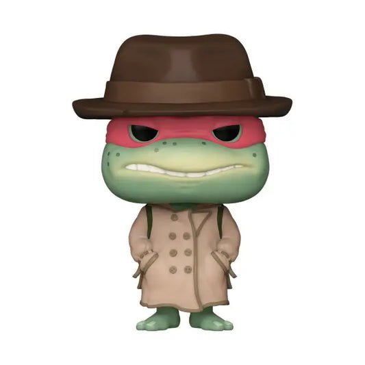 Cartoon-style green frog figurine in brown hat and trench coat from Teenage Mutant Ninja Turtles