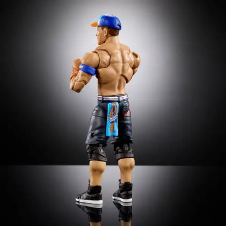 Action figure of a muscular wrestler in WWE Ultimate Edition John Cena outfit