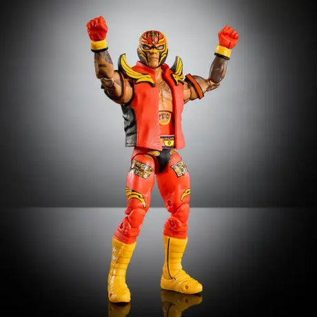 WWE Ultimate Edition Rey Mysterio Action Figure in red and yellow attire with mask