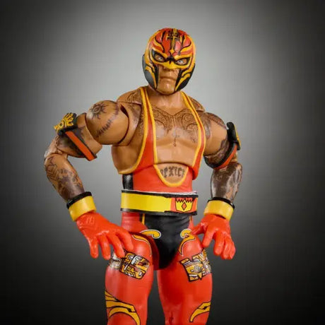 WWE Ultimate Edition Rey Mysterio Action Figure in red and yellow costume with mask