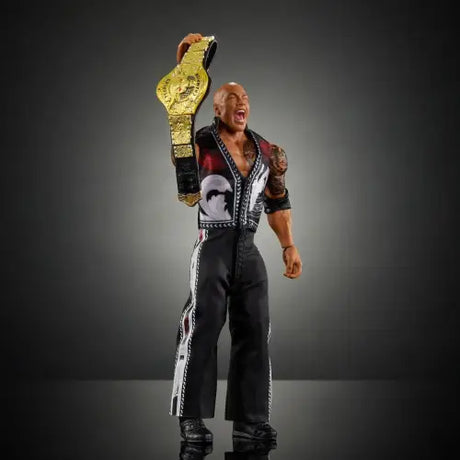 WWE Ultimate Edition Wave 25 The Rock Action Figure holding championship belt