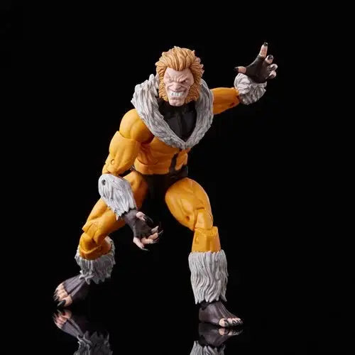 Classic Marvel Legends Sabretooth Action Figure: Toy man in yellow outfit