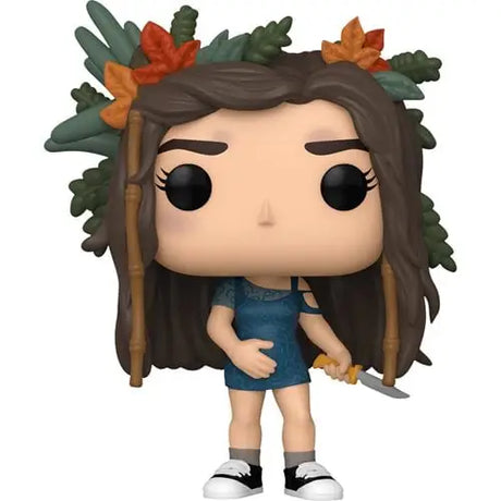 Cartoon-style Yellowjackets Shauna Funko Pop with autumn leaves and blue dress