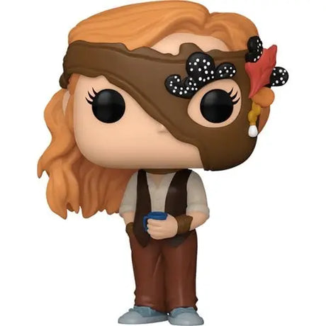 Funko Pop-style Van figurine from Yellowjackets holding a blue object with orange hair