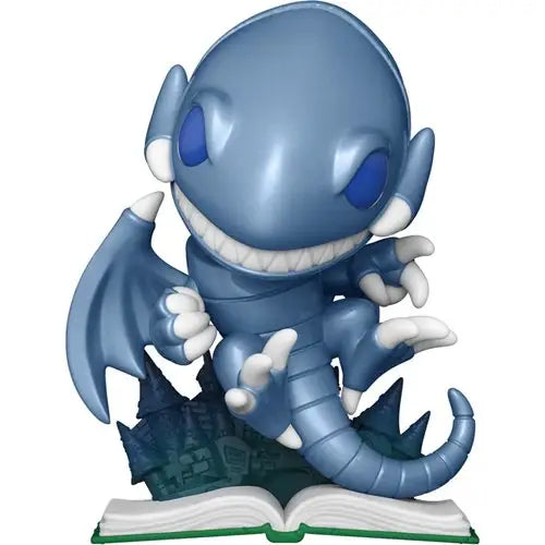 Blue Eyes Toon Dragon FunKo Pop! vinyl figure featuring blue and white pokemon on a book.