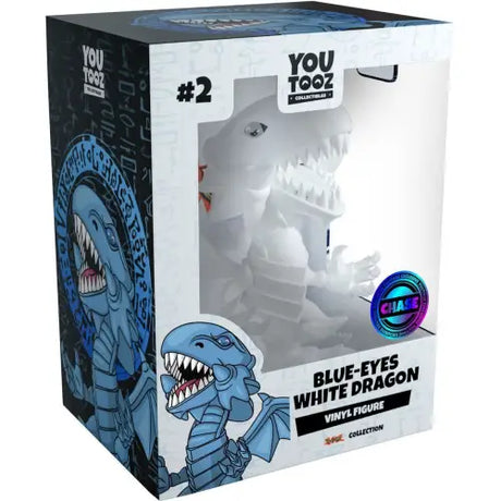 Boxed vinyl figure of a blue-eyes white dragon from the Yu-Gi-Oh! production run