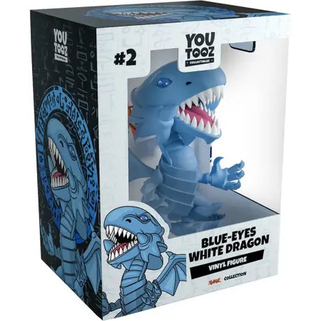 Blue cartoon figurine of the Blue-Eyes White Dragon in product packaging