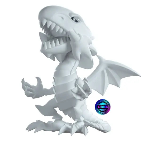 Cartoon-style Blue Eyes White Dragon figurine with sharp teeth from production run