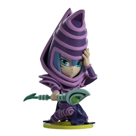 Cartoon figurine of Dark Magician in purple robes from Yu-Gi-Oh! Collection line