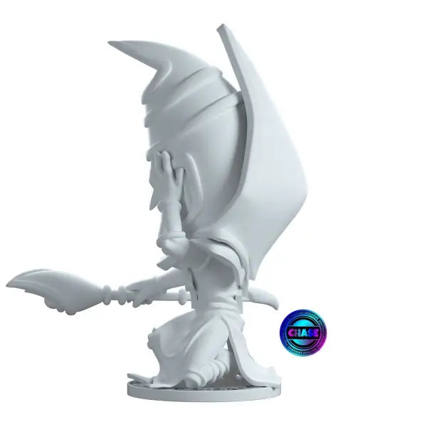 White figurine of Dark Magician with wings, part of the production run vinyl figure collection